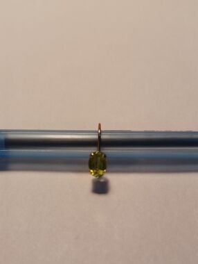 Single 10k Peridot Stone Earring.